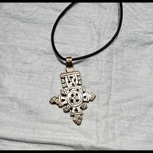 Ethiopian Coptic cross made with metal an leather